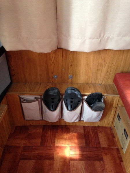 Shoe organizer in a tent camper from Starling Travel