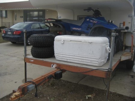 Truck Camper on a Flatbed Trailer